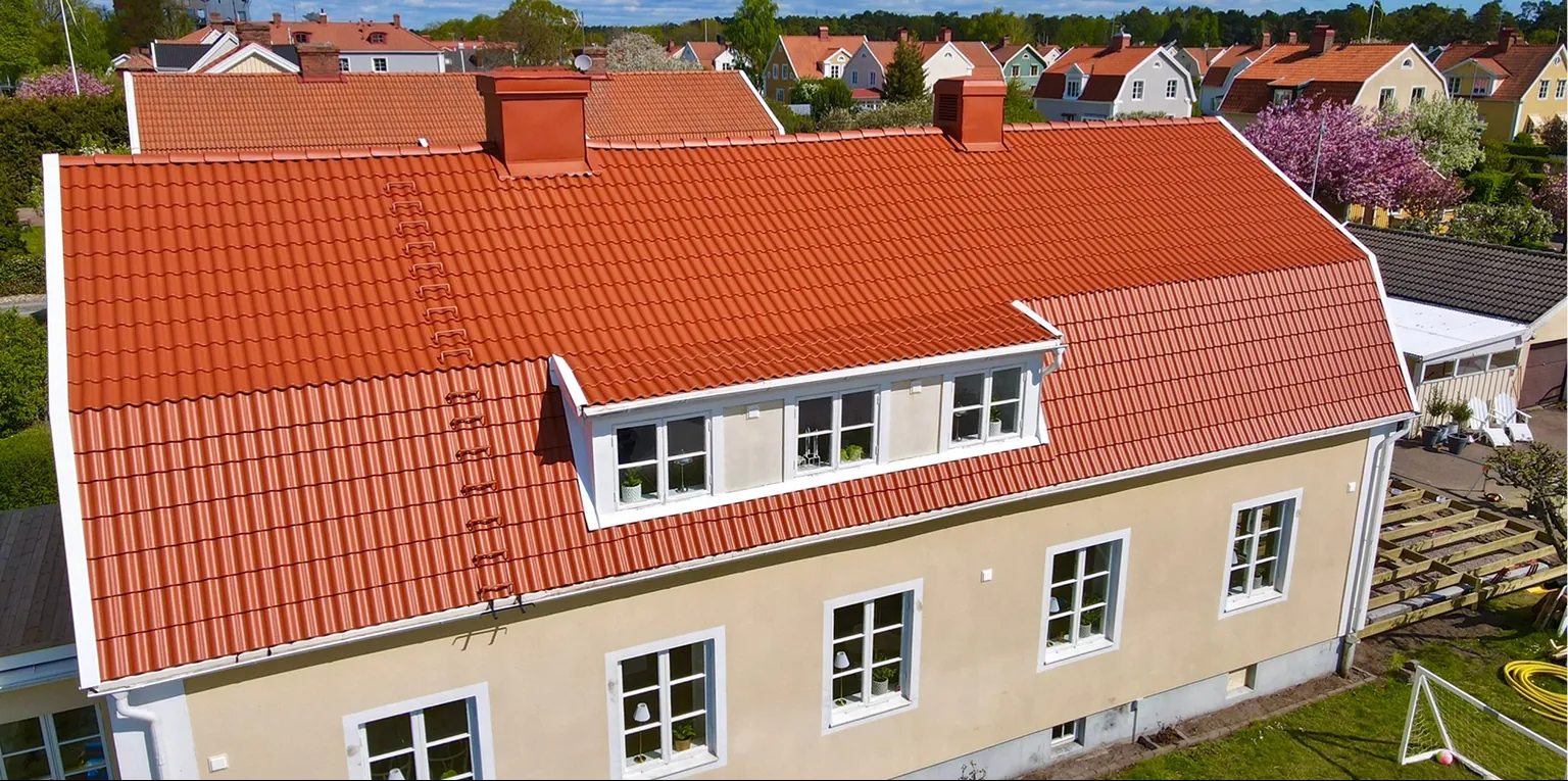 Familjevilla i Sollentuna – tegelröd – efter